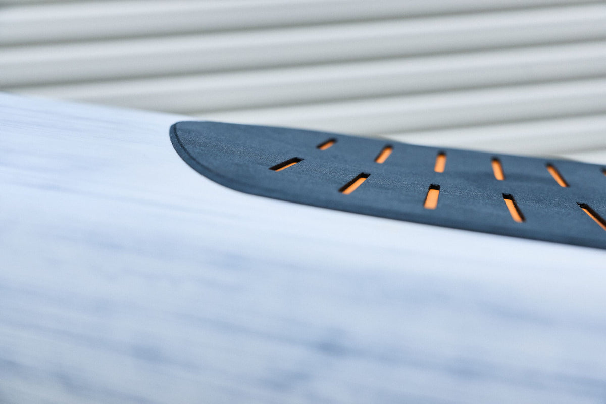 Close view of the Downwind SUP deck pad edge and rail