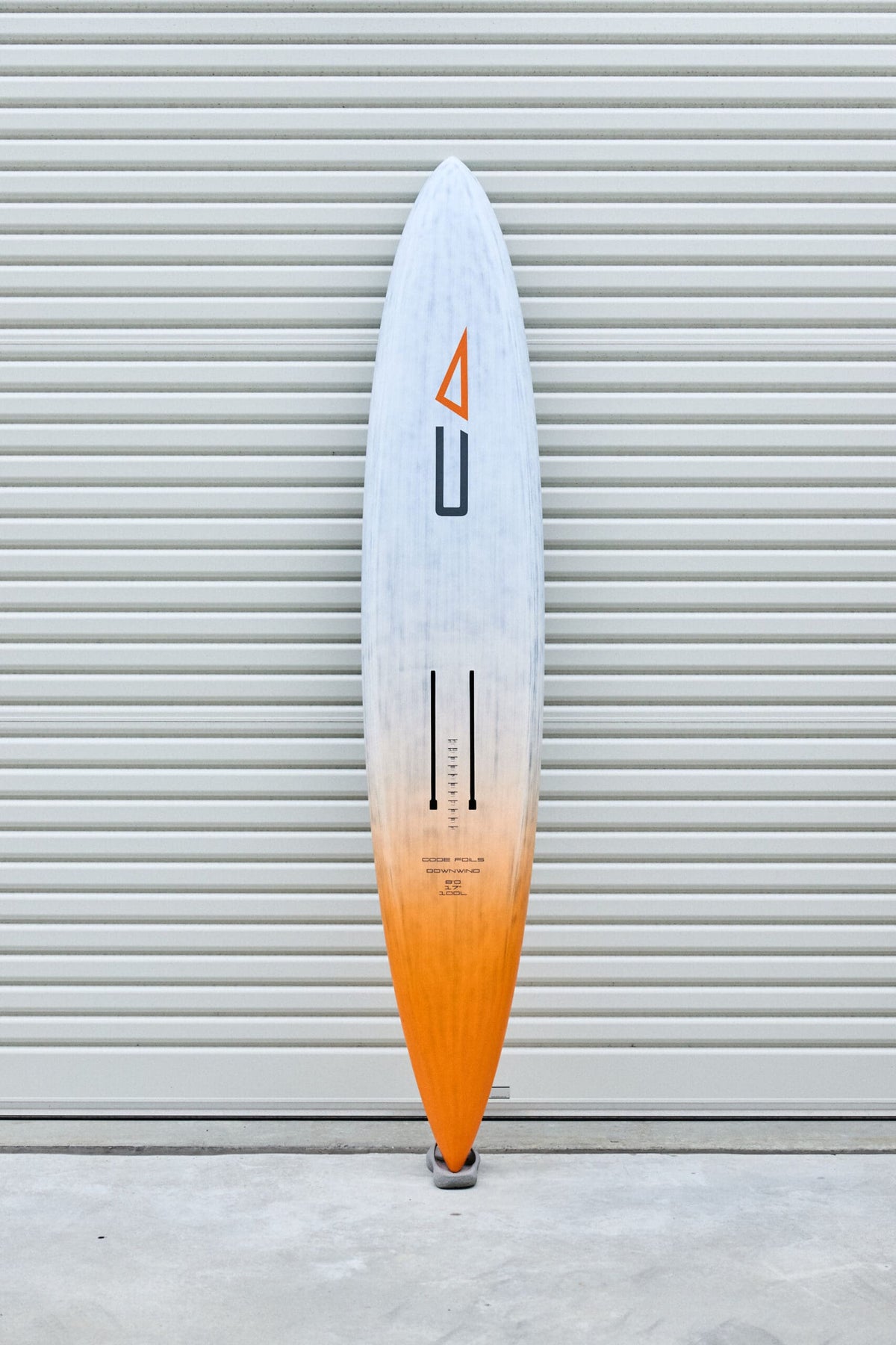 Full underside view of the Code Foils Downwind SUP board and twin foil tracks