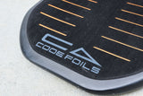Kanga board deck pad detail with orange grooves and Code Foils branding