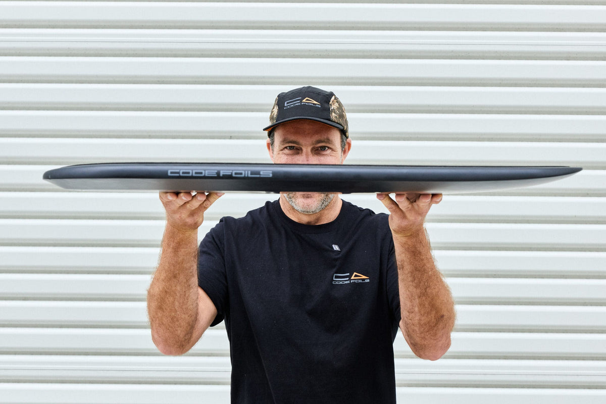 Thin side profile of the Code Foils Kanga board held horizontally