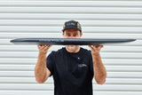 Thin side profile of the Code Foils Kanga board held horizontally