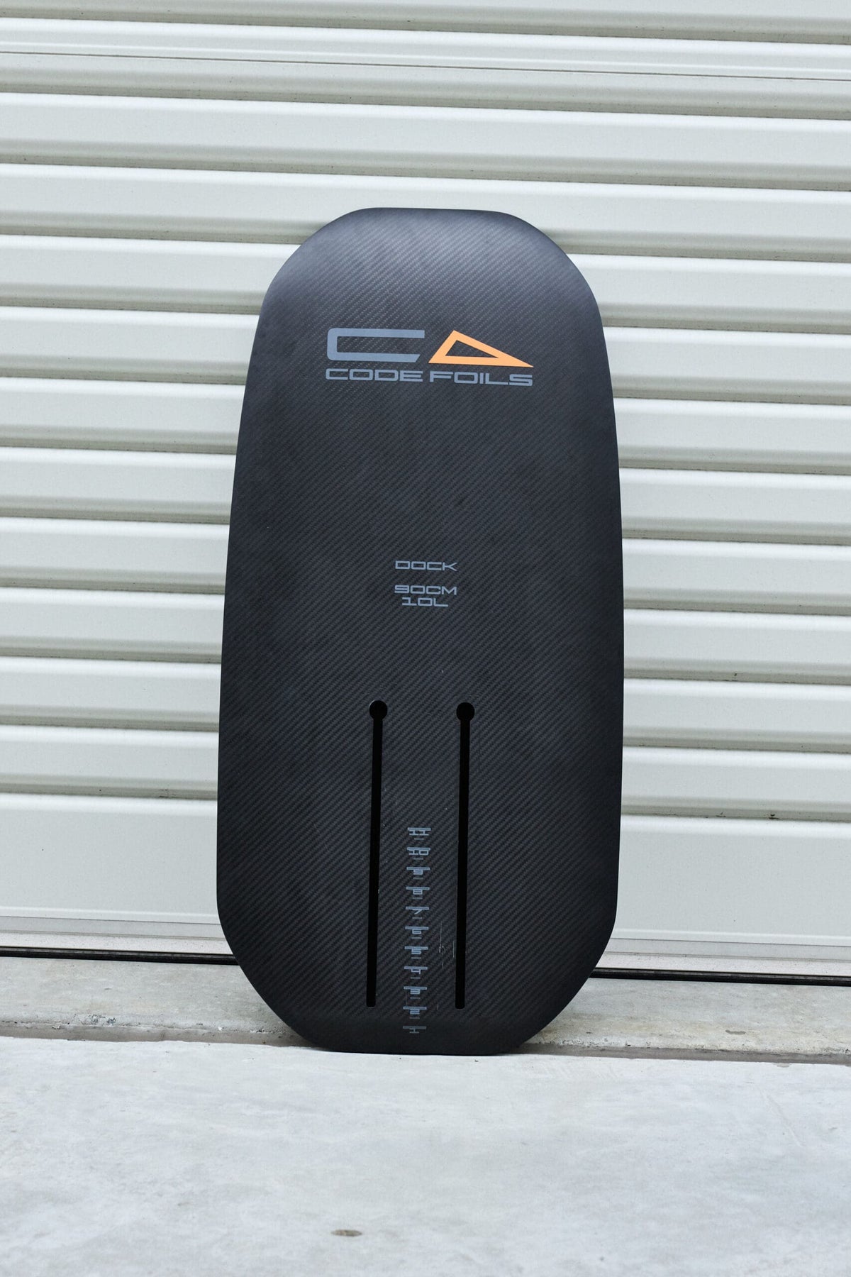 Full underside view of the black Code Foils Kanga board