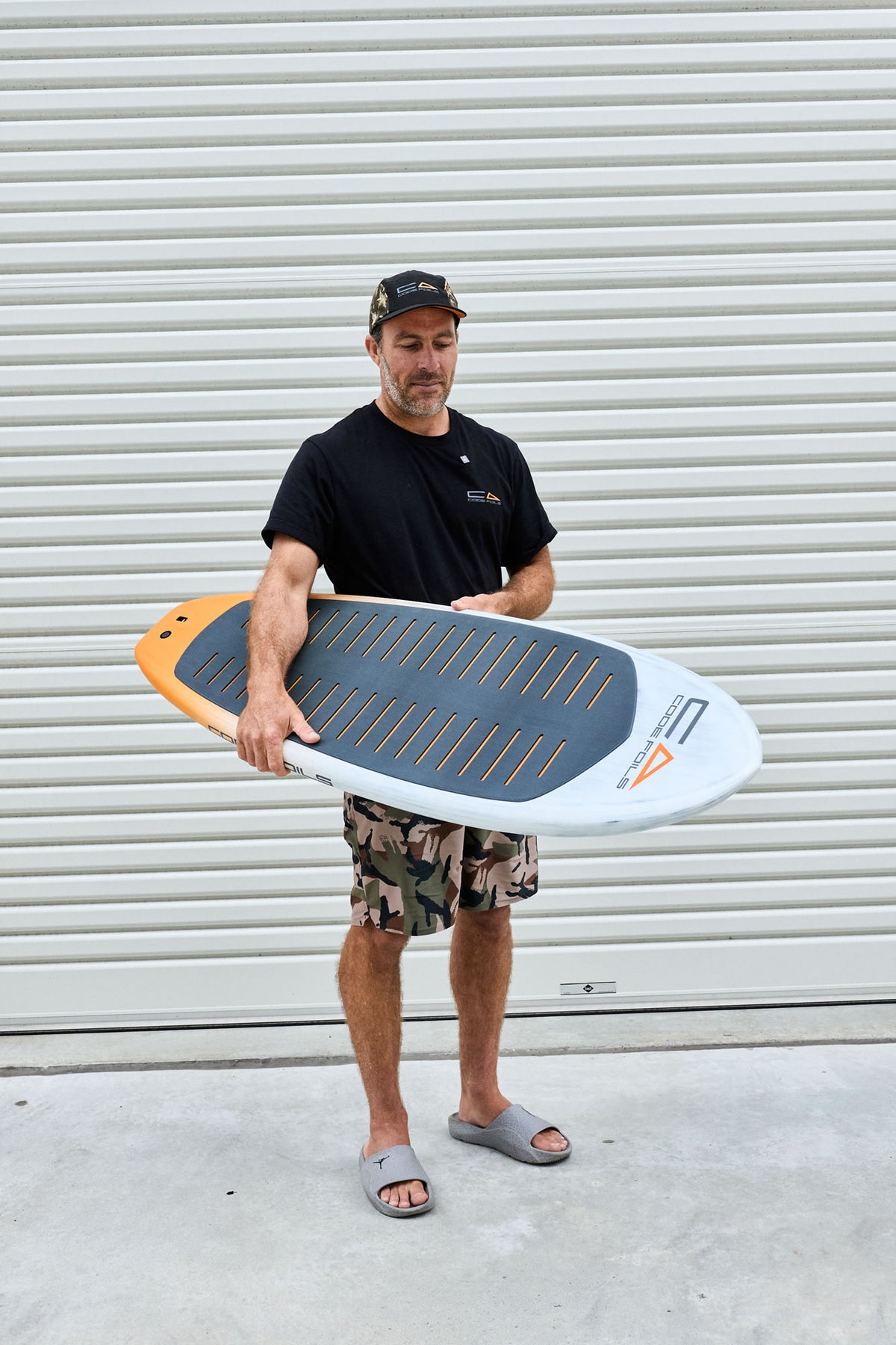 Code Foils Prone board held horizontally to show the deck and outline