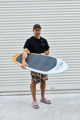 Code Foils Prone board held horizontally to show the deck and outline