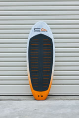Full deck view of the Code Foils Prone board and black traction pad