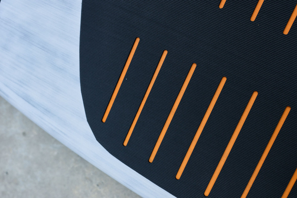 Textured WASP deck pad with orange grooves