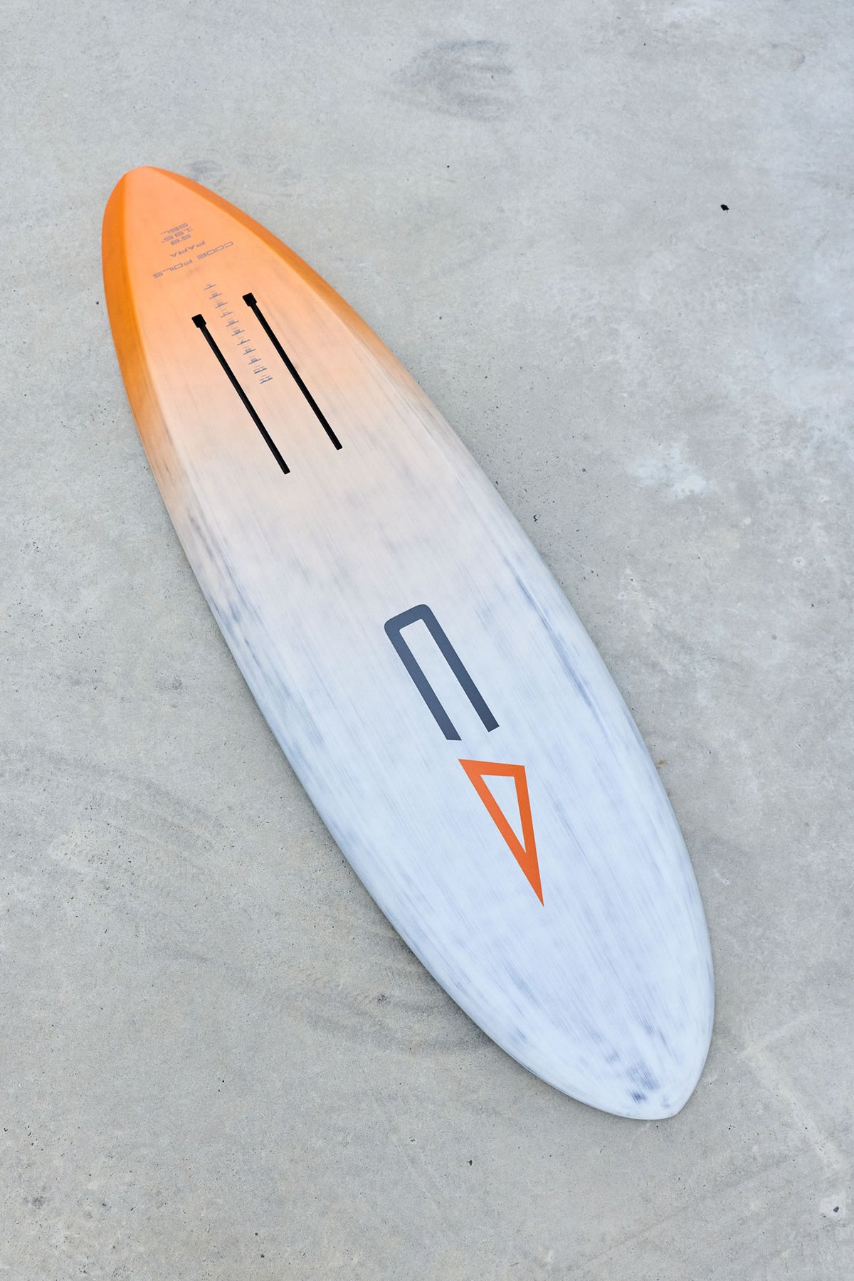 Angled underside view of the white and orange Code Foils WASP board