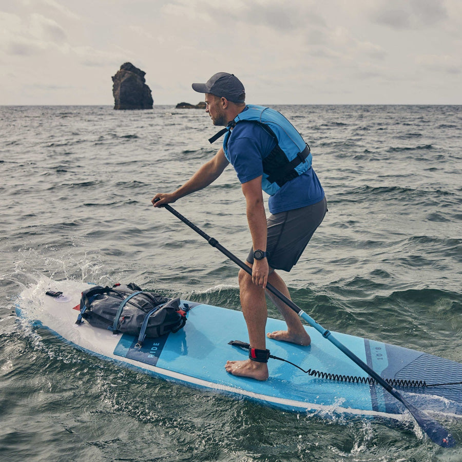 Red Paddle Co 10'8 Ride being paddled in coastal water